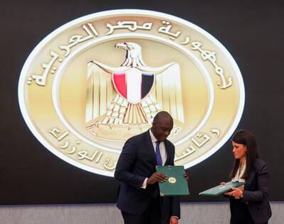 IFC managing director Makhtar Diop and Egyptian minister Rania Al Mashat at the signing ceremony. Reuters