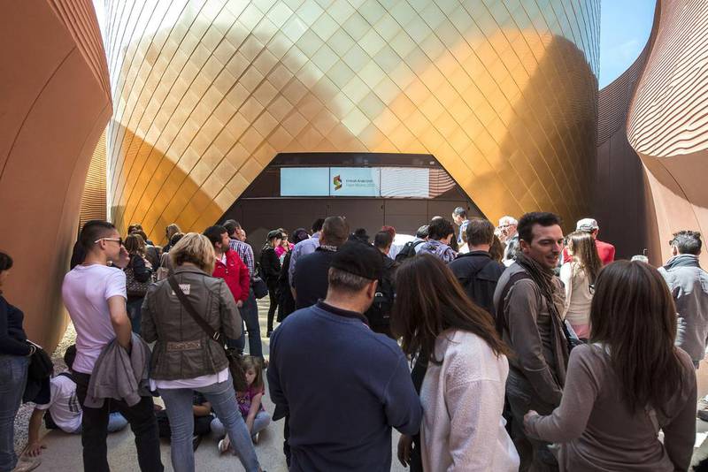 Visitors queue as they wait to enter the UAE pavilion at the Milan Expo 2015. Giuseppe Aresu / The National