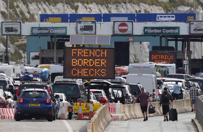 Staffing at French border control at the Port of Dover is 'woefully inadequate', causing holidaymakers to be stuck in long queues, the Kent port said. PA