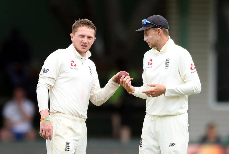 England's Dom Bess, left, and captain Joe Root. Reuters