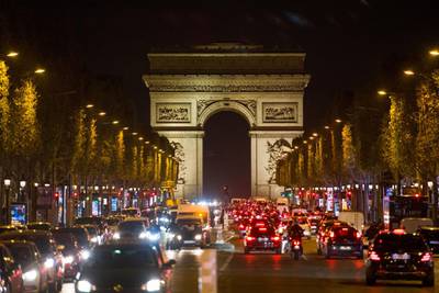 Traffic on the Champs Elysees, ahead of a national lockdown, in Paris, France. France will clamp down on movement for at least a month. Bloomberg