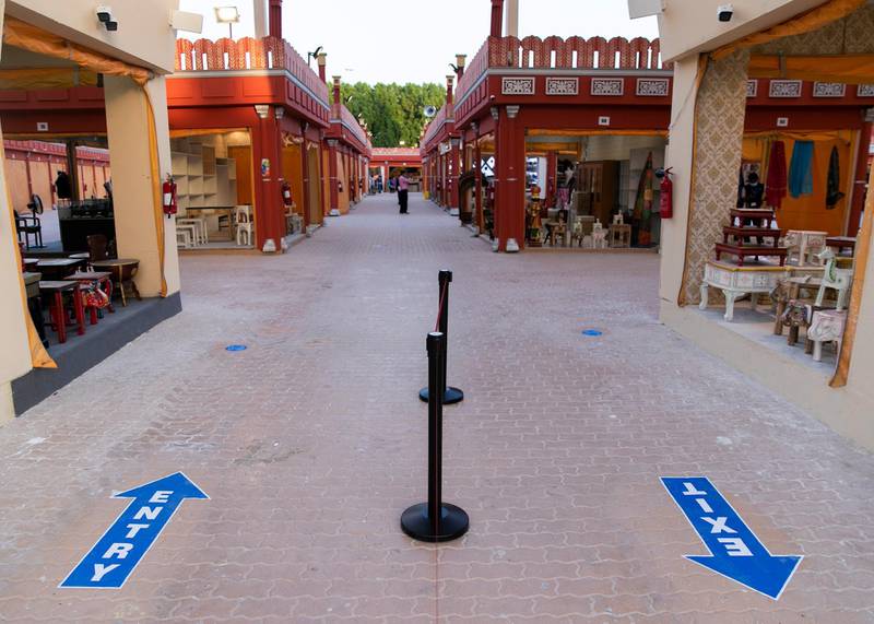 DUBAI, UNITED ARAB EMIRATES. 25 OCTOBER 2020. Entrance and exit marks outside the pavilions to maintain social distancing at Global Village 2020. GV celebrates it’s 25th season this year. (Photo: Reem Mohammed/The National)Reporter:Section:
