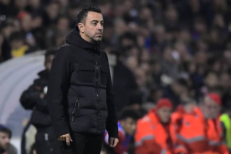 Barcelona manager Xavi stands on the touchline. AFP