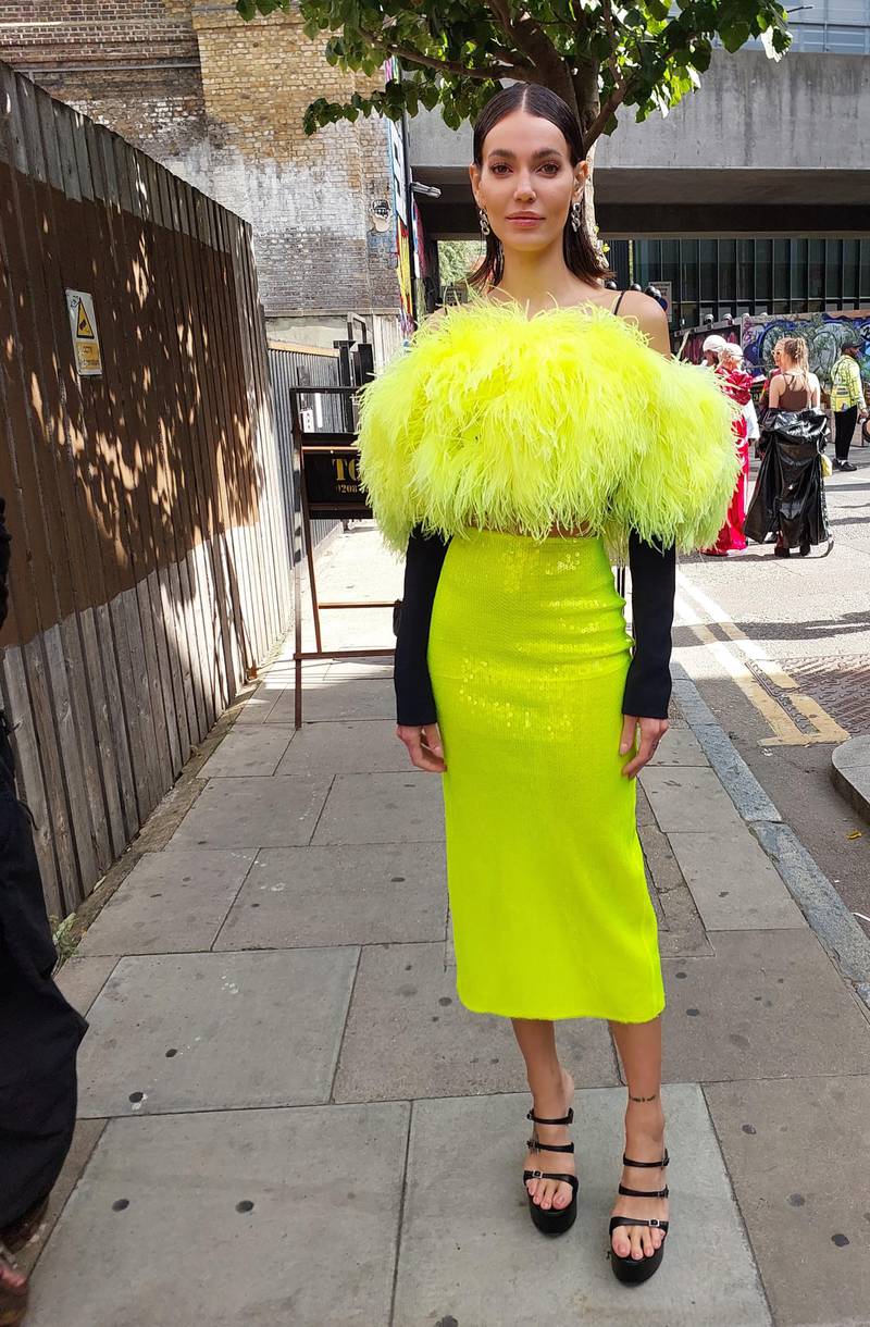 Neon yellow sequins and marabou feathers in East London. 