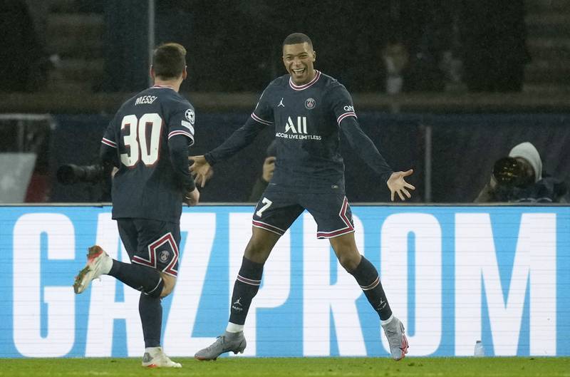 PSG's Kylian Mbappe, right, and Lionel Messi celebrate . AP