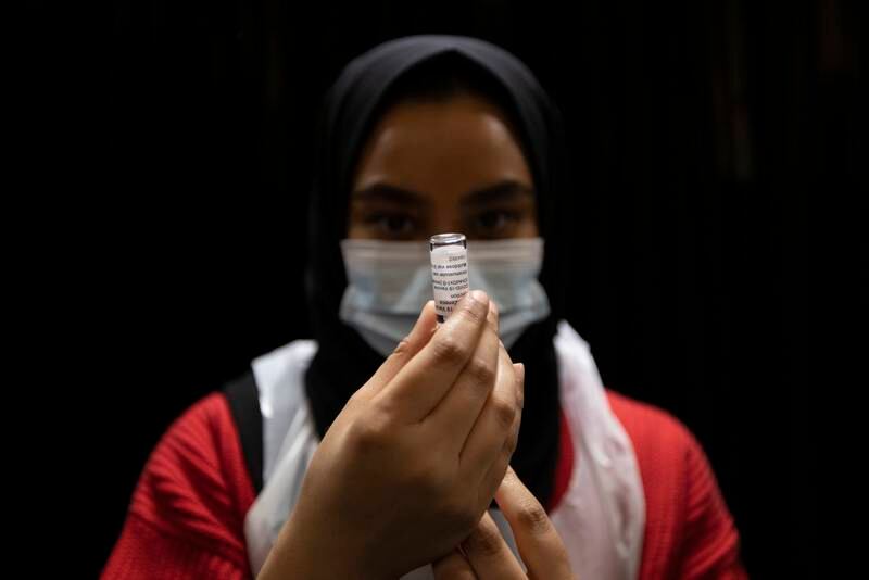 A nurse prepares the AstraZeneca jab at a mosque in London, England. Getty