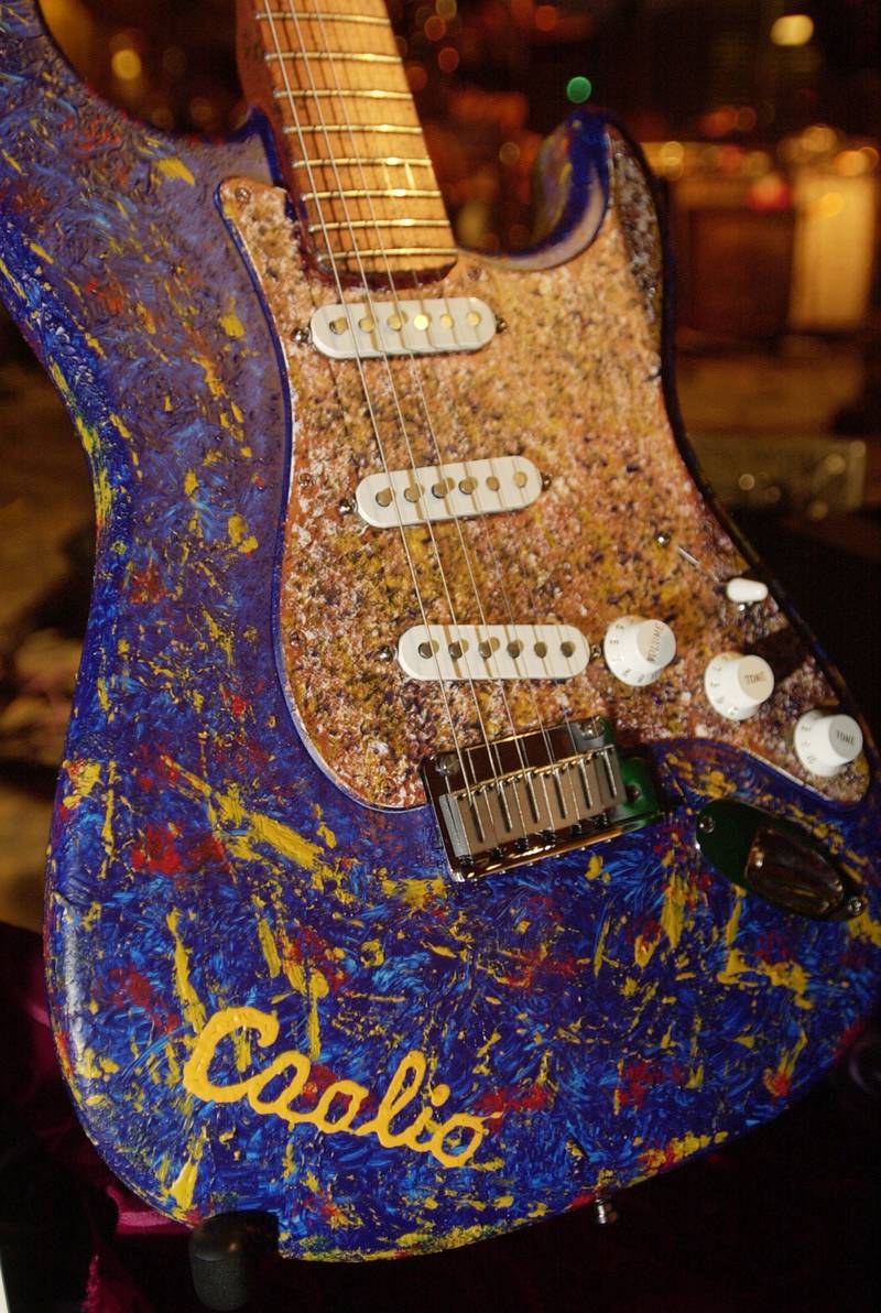 A Fender Stratocaster guitar decorated by Coolio. Getty Images 
