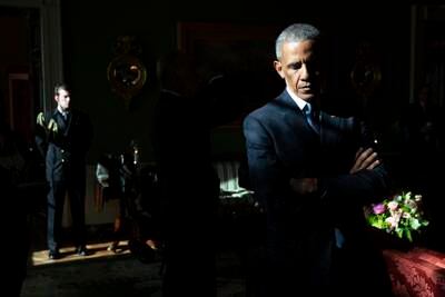 Mr Obama takes a moment to himself before delivering remarks to the nation after yet another mass shooting. Photo: The National Archives
