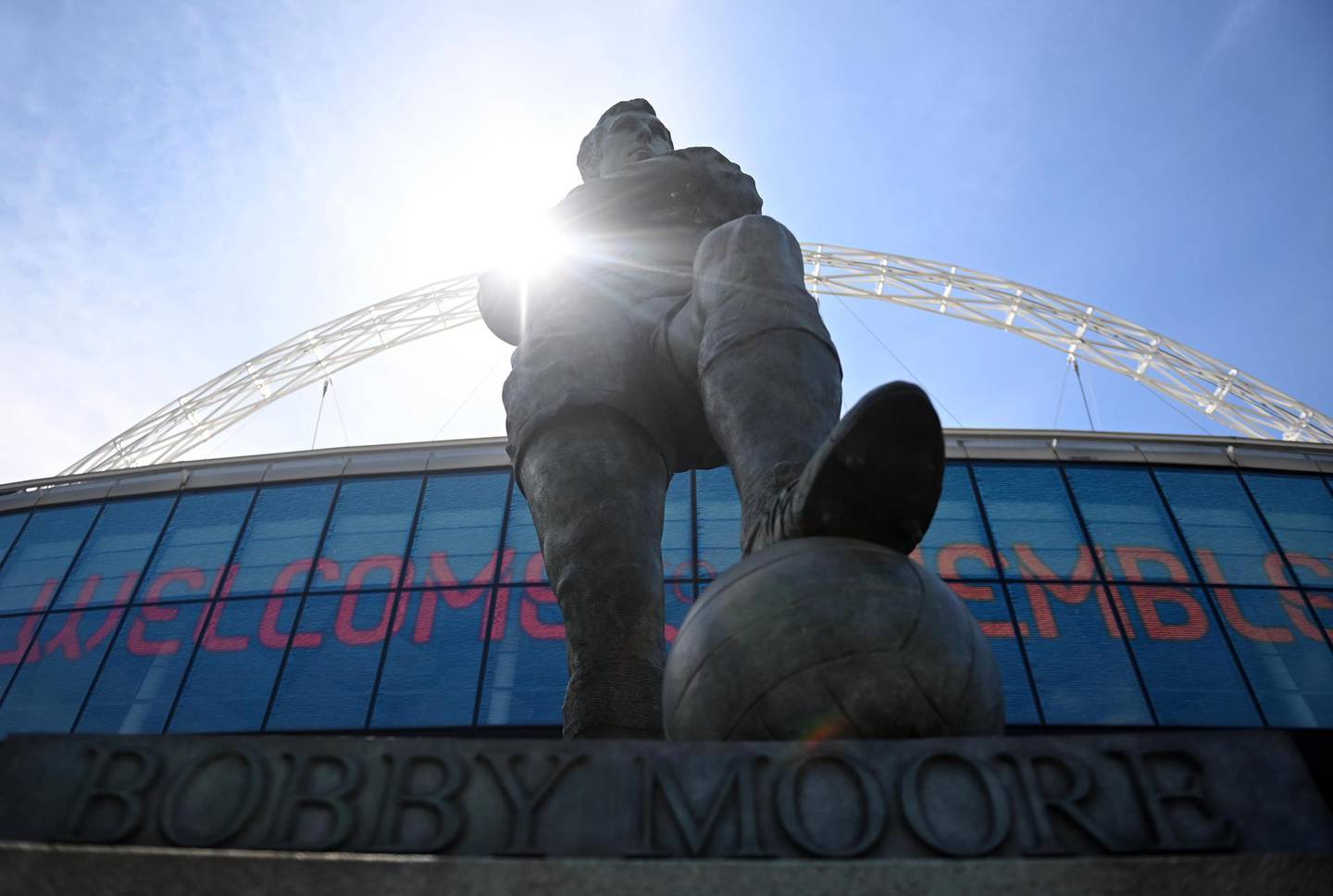 epa09254880 A monument to former England player Sir Bobby Moore outside Wembley Stadium ahead of the UEFA Euro 2020 soccer tournament in London, Britain, 08 June 2021. The tournament will take place on 11 June 2021 with the final at Wembley Stadium on 11 July 2021.  EPA/NEIL HALL