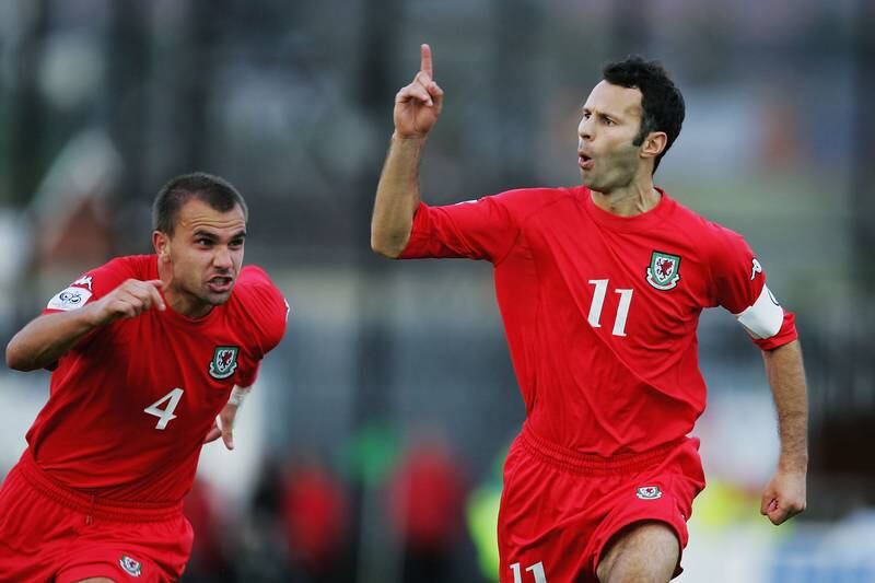 Ryan Giggs celebrates scoring for Wales during the World Cup qualifier between Northern Ireland and Wales in Belfast in 2005. Giggs, one of the most high-profile players to represent the country, never made it to the World Cup with the team. 