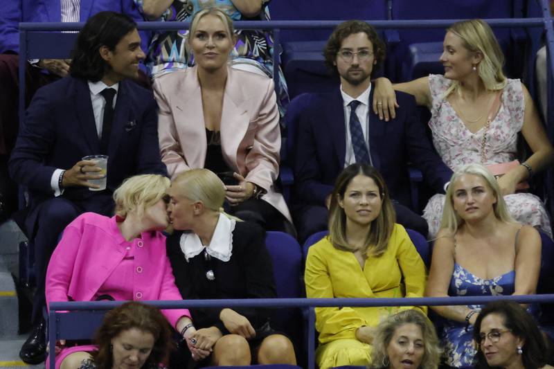Actreess Rebel Wilson kisses girlfriend Ramona Agruma while sitting in a box with Lindsey Vonn and boyfriend Diego Osorio. Reuters