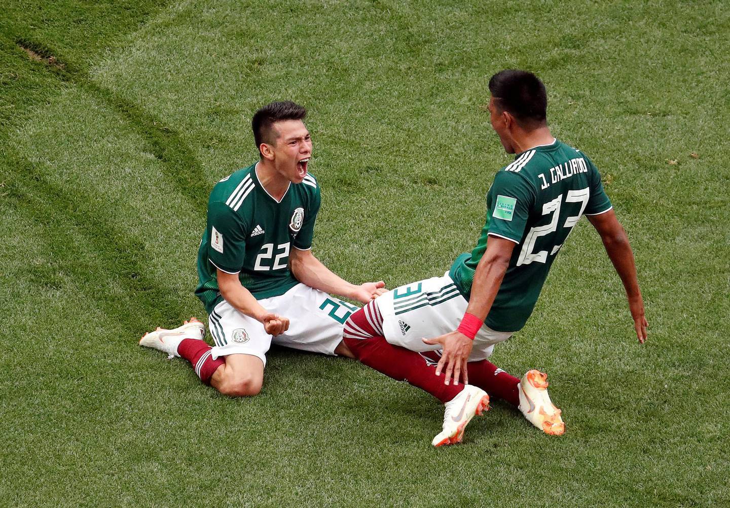 Soccer Football - World Cup - Group F - Germany vs Mexico - Luzhniki Stadium, Moscow, Russia - June 17, 2018   Mexico's Hirving Lozano celebrates scoring their first goal with Jesus Gallardo             REUTERS/Christian Hartmann     TPX IMAGES OF THE DAY