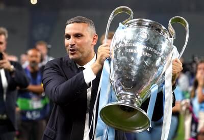 Manchester City chairman Khaldoon Al Mubarak with the Champions League Trophy following victory over Inter Milan at the Ataturk Olympic Stadium, Istanbul. PA