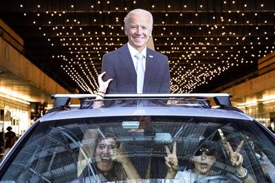 Motorists celebrate after the 2020 presidential election is called for President-elect Joe Biden, Saturday, November 7, in Philadelphia. AP