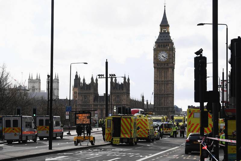 LONDON, ENGLAND - MARCH 22:  Ambulances, police vehicles and emergency services seen on Westminster Bridge on March 22, 2017 in London, England. A police officer was stabbed near to the British Parliament and the alleged assailant shot by armed police. Scotland Yard also reported an incident on Westminster Bridge where one woman has been killed and several people seriously injured by a car.  (Photo by Carl Court/Getty Images)