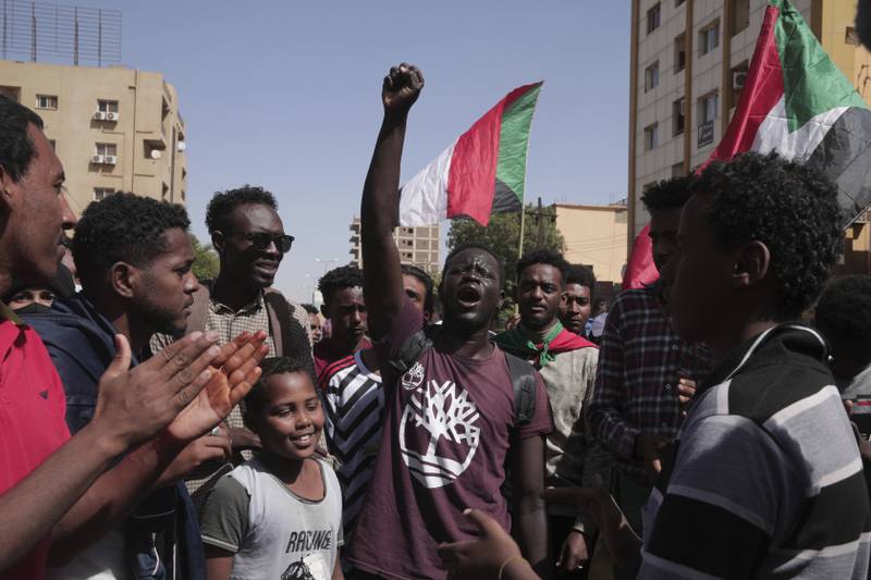 Protesters call for civilian rule and condemn Sudan's military administration, in the capital Khartoum on Monday. AP