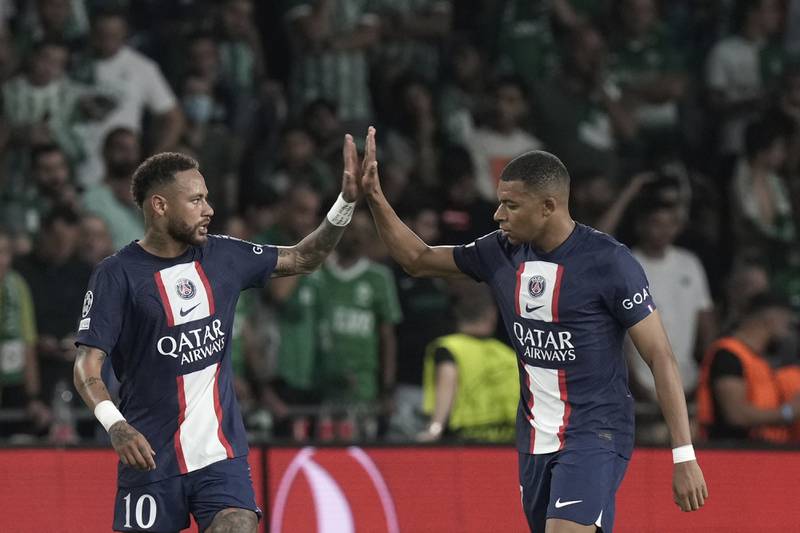 Neymar and Kylian Mbappe celebrate after PSG go ahead in the 3-1 Champions League win against Maccabi Haifa. EPA