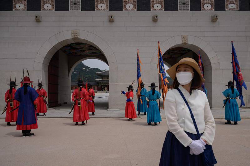 Costumed royal guards take part in a 'changing of the guards' ceremony at Gyeongbokgung palace in Seoul, South Korea. AFP