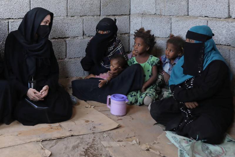 UNHCR special envoy Angelina Jolie meets women and children at a makeshift camp for people displaced by war, in Lahej, Yemen. Female stakeholders are pushing for deeper involvement in peace talks. Reuters