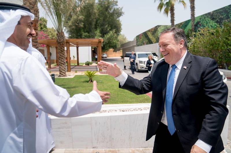 Sheikh Abdullah bin Zayed greets Mr Pompeo at the Al Shati Palace. AP Photo