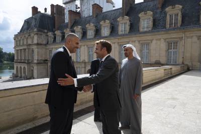 President Macron receives Khaldoon Al Mubarak, chief executive and managing director of Mubadala, chairman of Abu Dhabi Executive Affairs Authority and Abu Dhabi Executive Council member. They are with Sheikh Mohamed bin Zayed.
