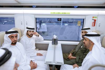 Sheikh Mohammed and Sheikh Hamdan bin Mohammed, Crown Prince of Dubai, in a carriage with other officials. Photo: Dubai Media Office