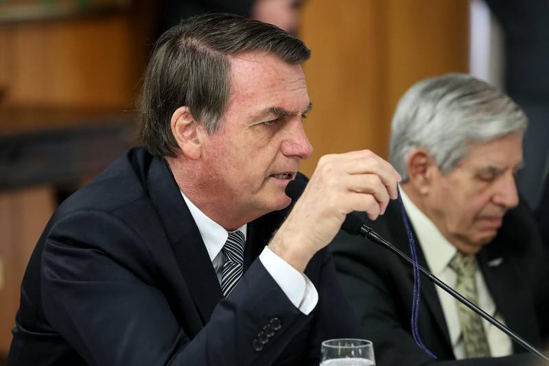 Handout picture released by the Brazilian Presidency press office showing Brazilian President Jair Bolsonaro during an interview with foreign correspondents at Planalto Palace in Brasilia on July 19, 2019. RESTRICTED TO EDITORIAL USE - MANDATORY CREDIT 'AFP PHOTO /  BRAZILIAN PRESIDENCY - MARCOS CORREA' - NO MARKETING - NO ADVERTISING CAMPAIGNS - DISTRIBUTED AS A SERVICE TO CLIENTS


 / AFP / BRAZILIAN PRESIDENCY / Marcos Correa / RESTRICTED TO EDITORIAL USE - MANDATORY CREDIT 'AFP PHOTO /  BRAZILIAN PRESIDENCY - MARCOS CORREA' - NO MARKETING - NO ADVERTISING CAMPAIGNS - DISTRIBUTED AS A SERVICE TO CLIENTS



