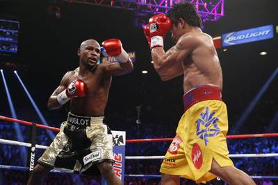 Floyd Mayweather, left, in action during his dominant points victory over Manny Pacquiao. AFP