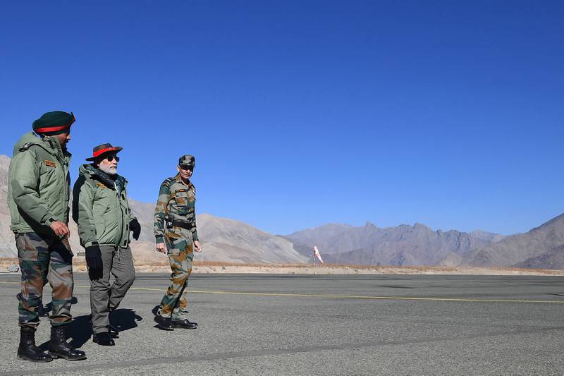 Mr Modi with officers at the Kargil base.