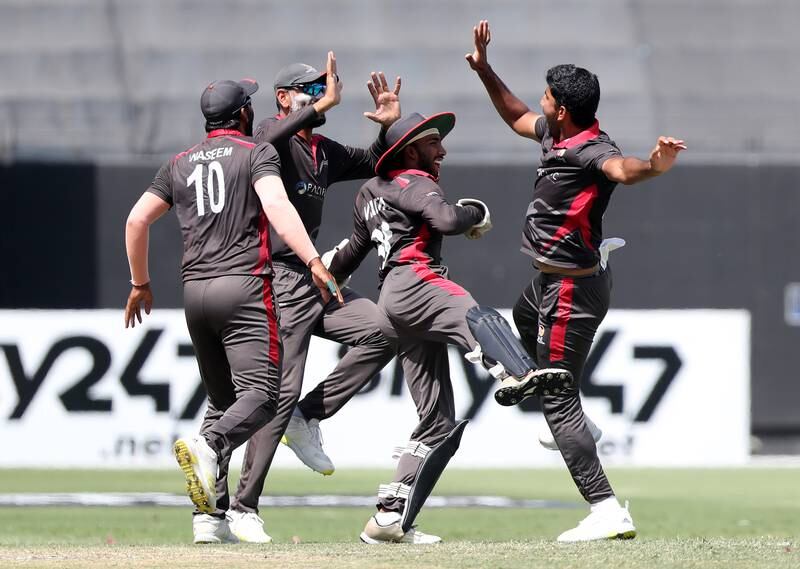 UAE's Junaid Siddique celebrates the wicket of Nepal's Dipendra Singh Airee during a one-day international cricket match at Dubai International Stadium. Chris Whiteoak / The National