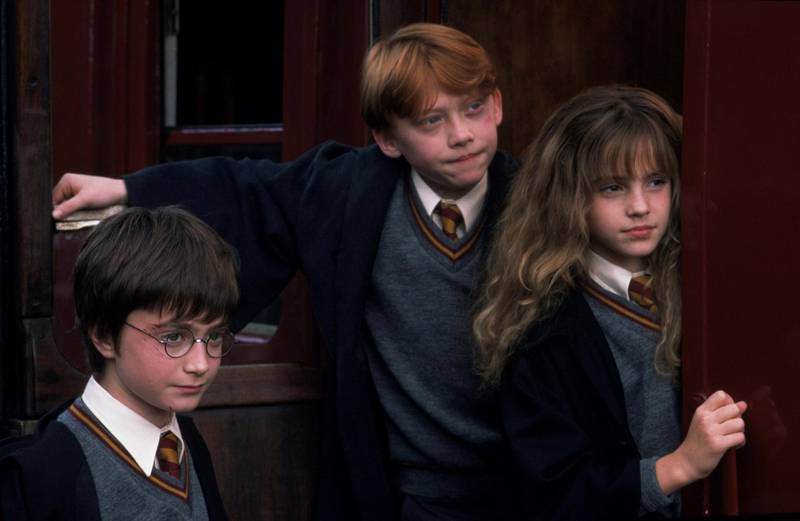 Daniel Radcliffe, Rupert Grint and Emma Watson in Harry Potter and the Philosopher's Stone. Courtesy Warner Bros. Pictures