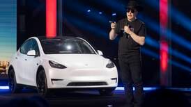Why is Elon Musk being sued by Tesla shareholders? 