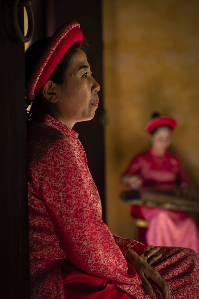 People runner up: 'Vietnamese woman in traditional clothing in the imperial city of Hue, Vietnam' by Walter Monticelli
