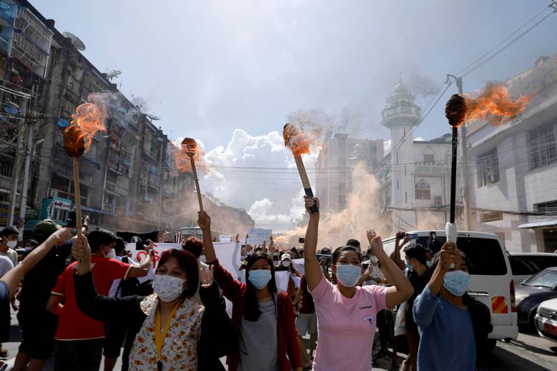 A group of protesters demonstrate against the military coup in Yangon, Myanmar. Reuters
