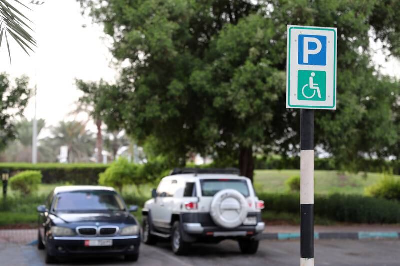 ABU DHABI , UNITED ARAB EMIRATES , OCT 8   ��� 2017 :-  Disabled parking signage in the parking area near the Corniche in Abu Dhabi. ( Pawan Singh / The National ) 