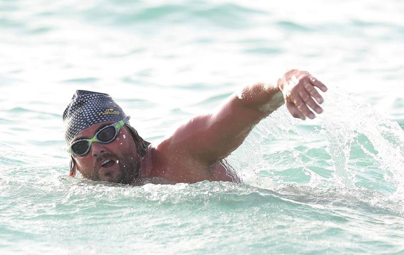 Dubai, United Arab Emirates - May 7th, 2018: French swimmer Steve Stievenart will be swimming non stop from 5:30am until 5:30pm to raise awareness of sea pollution. Monday, May 7th, 2018 at Kite Beach, Dubai. Chris Whiteoak / The National