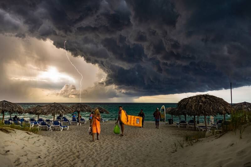 Honourable Mention, People and Nature, Giovani Cordioli, Brazil. Storm clouds in Varadero beach, Cuba.