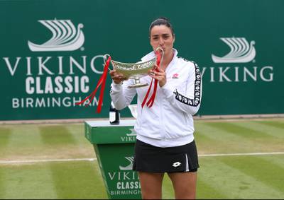 BIRMINGHAM, ENGLAND - JUNE 20: Ons Jabeur of Tunisia celebrates with the trophy after her victory against Daria Kasatkina of Russia in the Womens Singles Final during the Viking Classic Birmingham at Edgbaston Priory Club on June 20, 2021 in Birmingham, England. (Photo by Barrington Coombs/Getty Images for LTA)