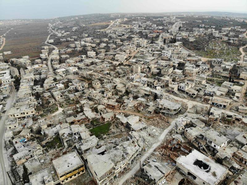 An aerial view taken on February 19, 2020 shows destroyed buildings in the Syrian town of Ihsim in the southern countryside of Idlib/  AFP