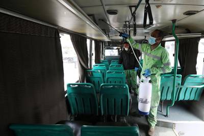 A Greater Amman Municipality employee sanitises public transport at one of stations. Reuters