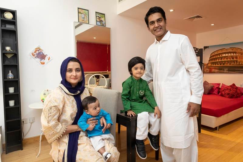 Dr Javairia Hassan, with her husband Hassan Ashraf and her two sons Mohammad and Ahmed, is keen to enjoy the 'true spirit' of Eid this year. Antonie Robertson / The National