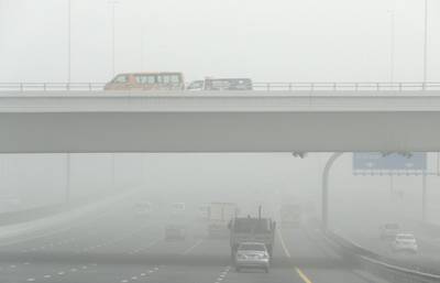 DUBAI, UNITED ARAB EMIRATES , Feb 26  – 2020 :- Traffic on Emirates road during the sandstorm in Dubai. (Pawan Singh / The National) For News/Online/Instagram.  