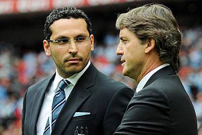 Khaldoon al Mubarak, the Manchester City chairman, left, and Roberto Mancini, the manager, have a scouting network at their disposal that numbers 32.