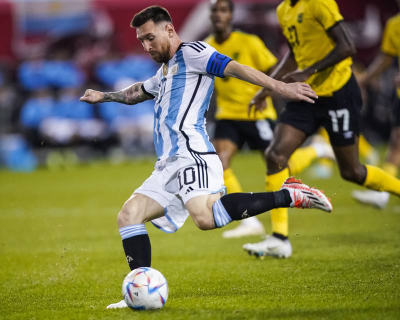 Lionel Messi scores for Argentina. AP