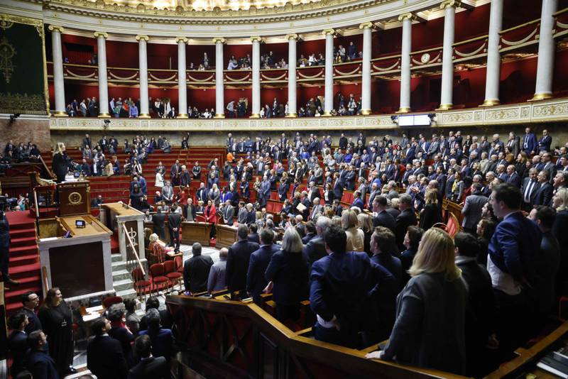 Left-wing MPs sang the French national anthem after the government cancelled a vote. AFP 