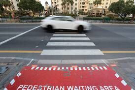 Speeding up as traffic lights turn amber was the most common reason for driving through red lights, Dubai Police said. Chris Whiteoak / The National