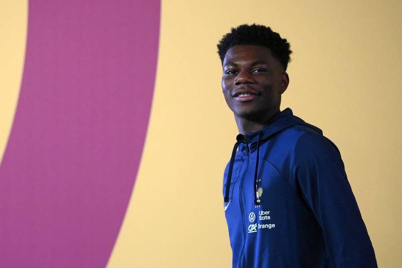 France midfielder Aurelien Tchouameni arrives for a press conference at the Qatar National Convention Centre in Doha on the eve of the match against Tunisia. AFP