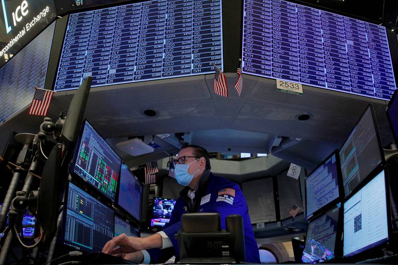 A trader works on the floor of the New York Stock Exchange. As the low interest-rate environment comes to an end, value investing is making a comeback for investors. Reuters