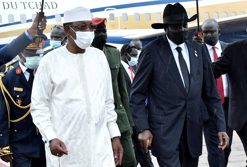 South Sudan's President Salva Kiir receives Chad President Idriss Deby as they prepare to attend the signing of peace agreement between the Sudan's transitional government and Sudanese revolutionary movements.  Reuters