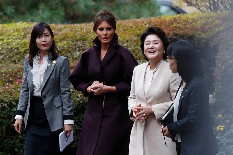 US First Lady Melania Trump, second left, and South Korean First Lady Kim Jung-Sook, second right, converse at the presidential house in Seoul, South Korea. Jeon Heon-Kyun / EPA
